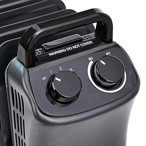 Amazon Basics Portable Radiator Heater With 7 Wavy Fins, Manual Control, Black, 1500W, 13.1 X 26.3 X 9.8 In 4 Amazon Basics Portable Radiator Heater With 7 Wavy Fins, Manual Control, Black, 1500W, 13.1 X 26.3 X 9.8 In - Image 4